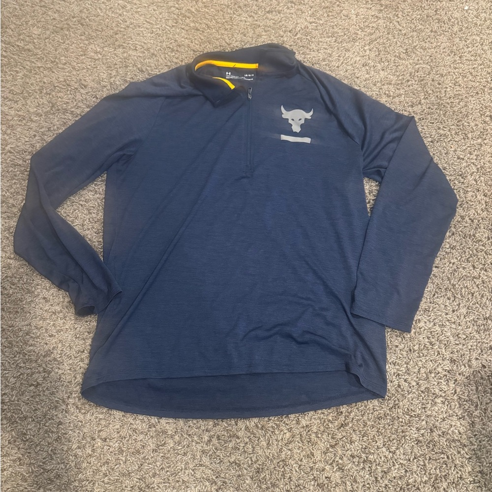 Project rock under Armour pullover. Fits more like a medium.